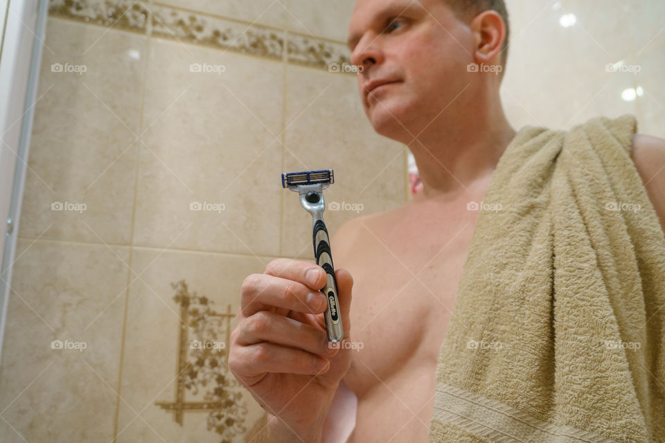 shaving man