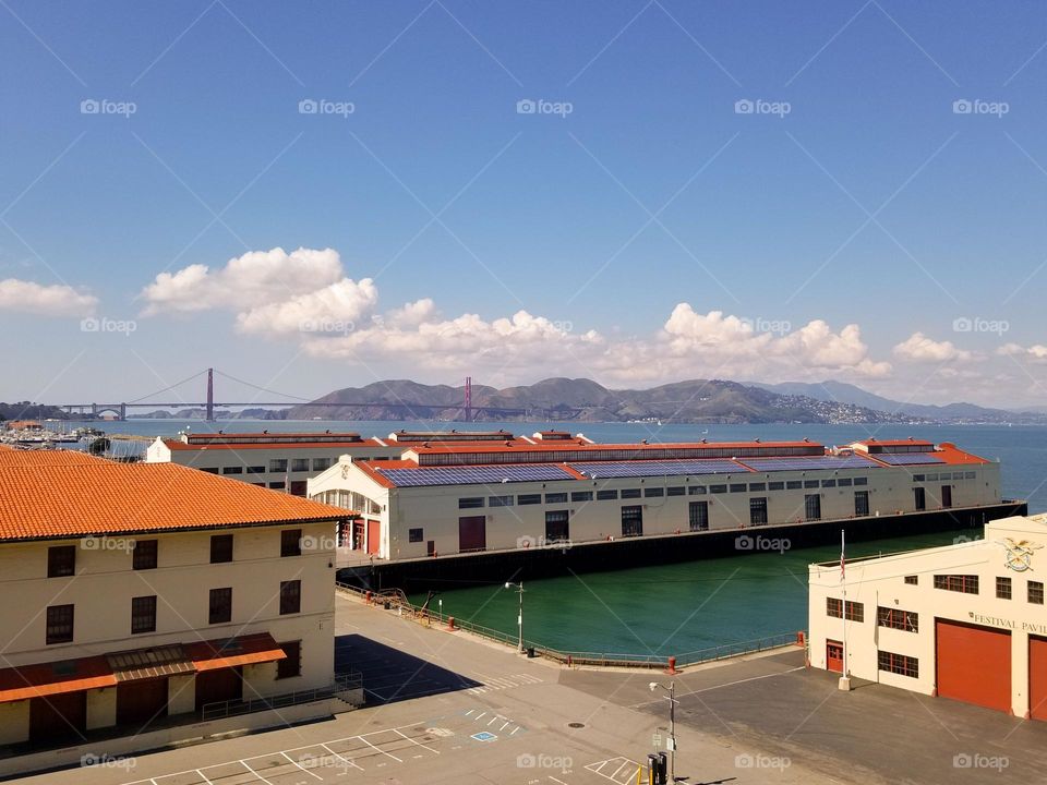 Fort Mason in San Francisco California with the Golden Gate Bridge in the background on a beautiful sunny afternoon 