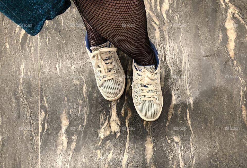 Sneakers and fishnets