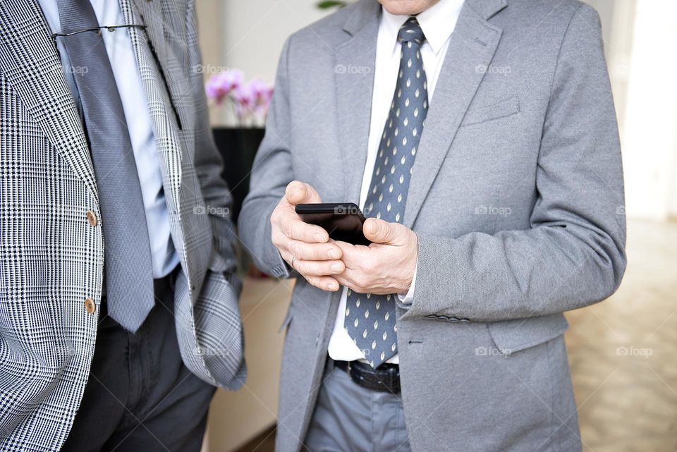 Businessman using phone