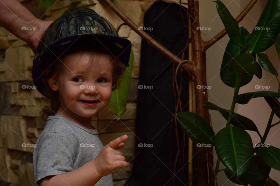 Child in a unique helmet