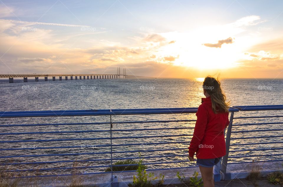 Women looking at view during sunset