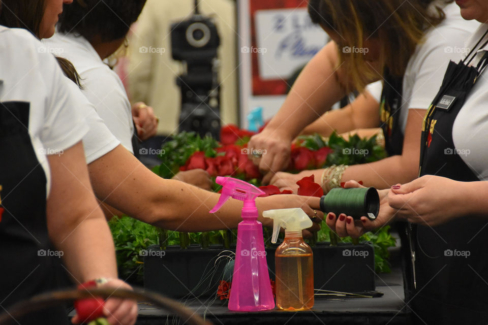 Roses being sewn for winning blanket