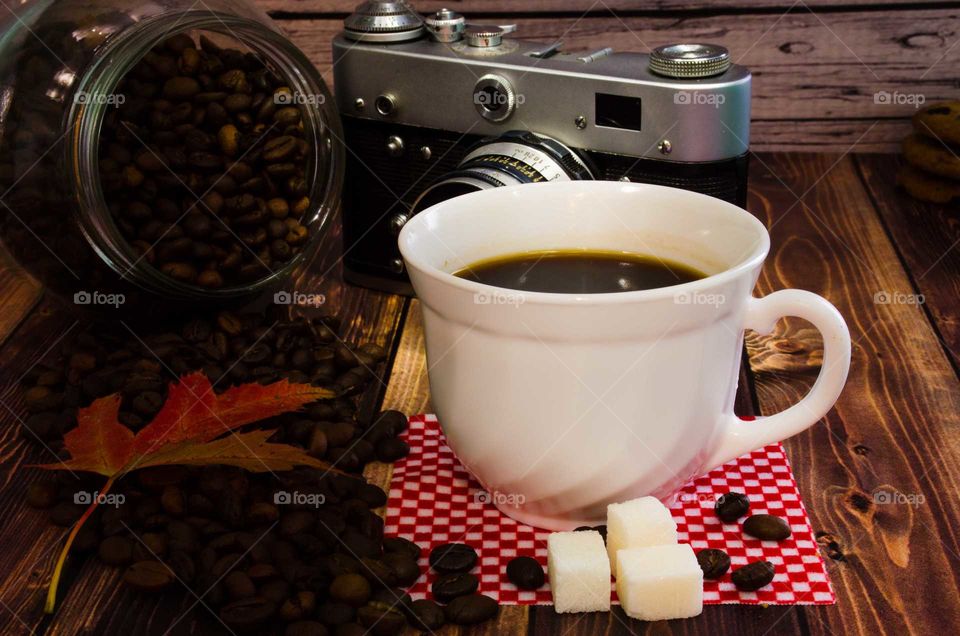 coffee been still life on wooden background