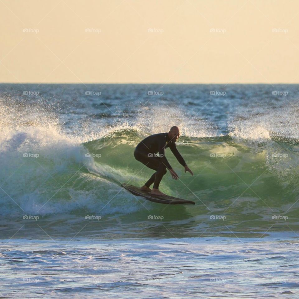 Surfing at Sunset