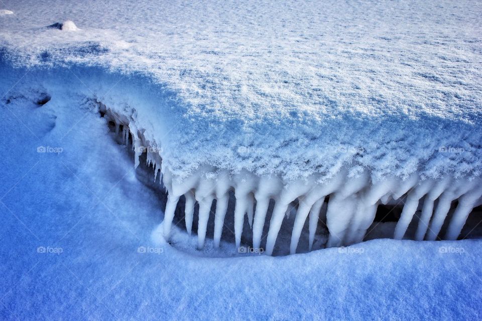 Icy crack in the frozen crust