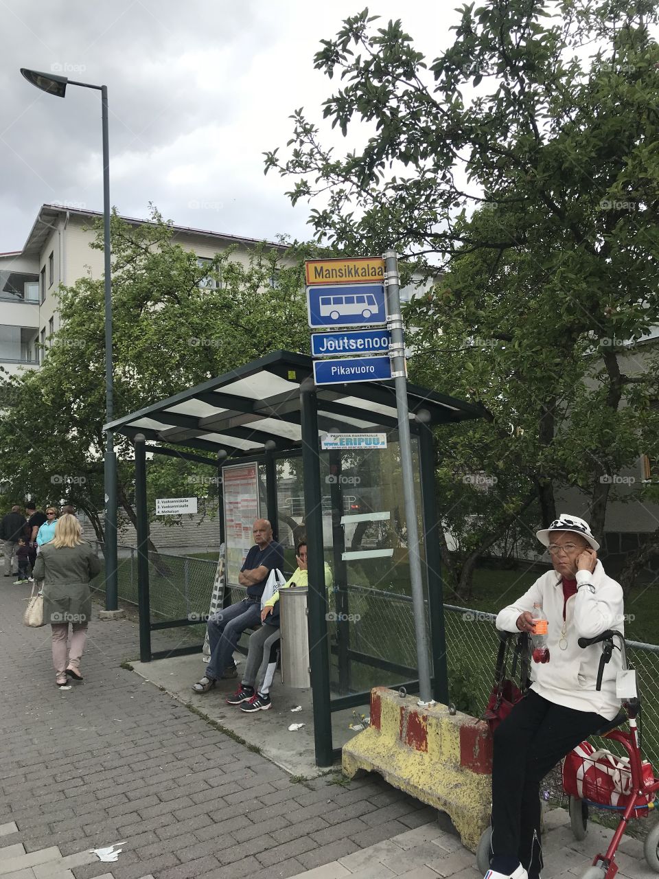 Bus stop in Imatra.Subbotny day, people went shopping in the city's hypermarkets, located in the center.Imatra. Finland . Suomi 🇫🇮