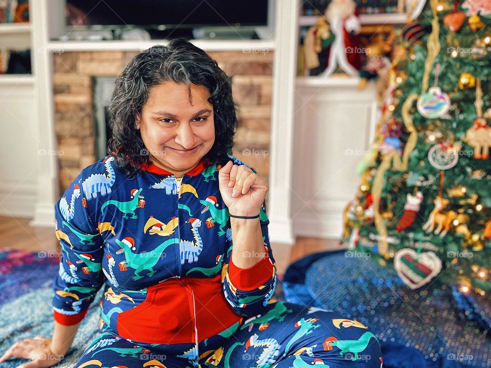 Mommy poses by Christmas tree, mommy being silly, mother dressed for holidays, funny mother portrait 