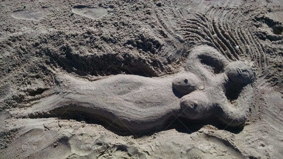 mermaid in the sand
