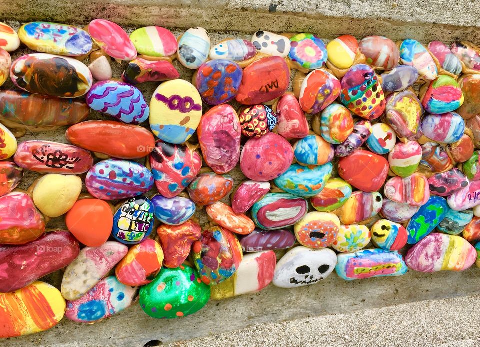 Multicolor painted stones created by elementary school students 2
