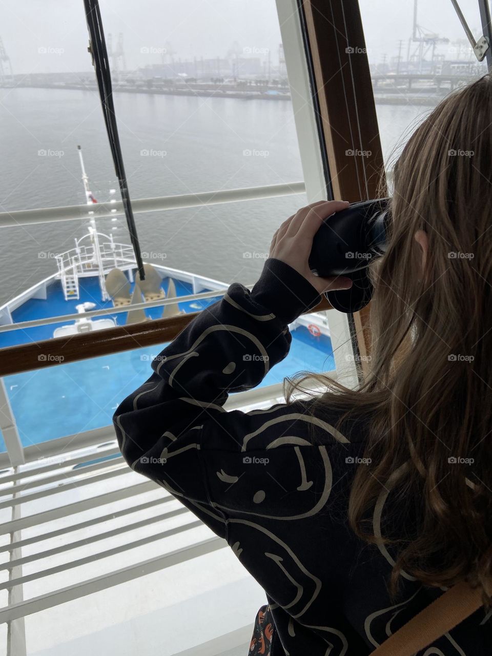 A young girl learning to be a watch leader with big dreams of becoming a cruise ship captain like her father.