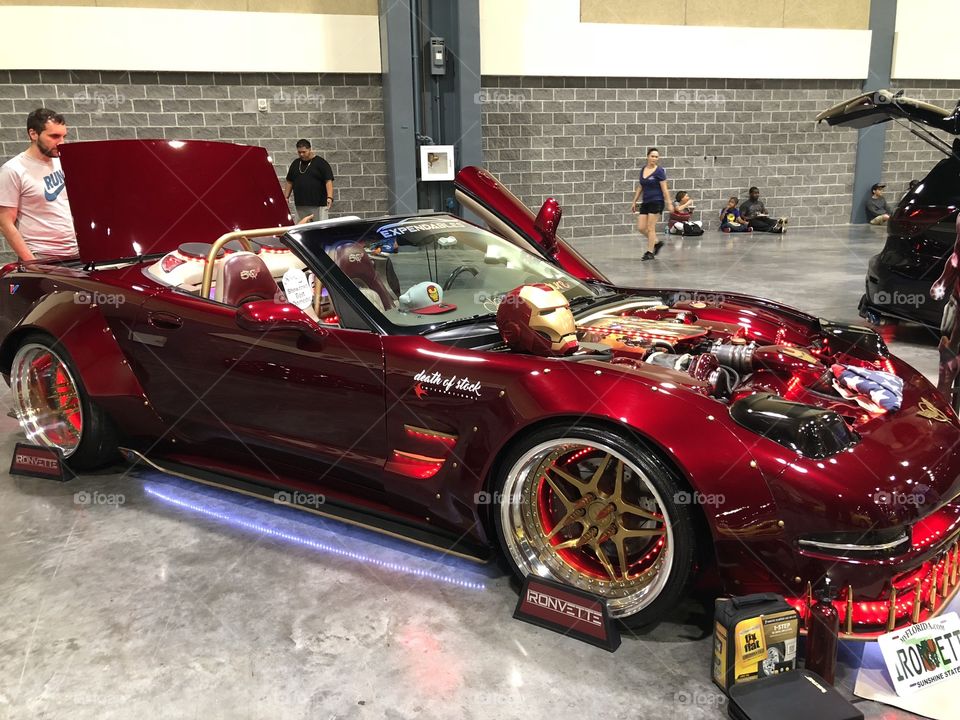 Here is a custom corvette that caught many peoples attention. I guess his favorite marvel character is Iron Man (stancenation)