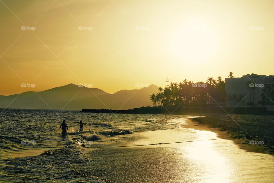 People enjoying at beach