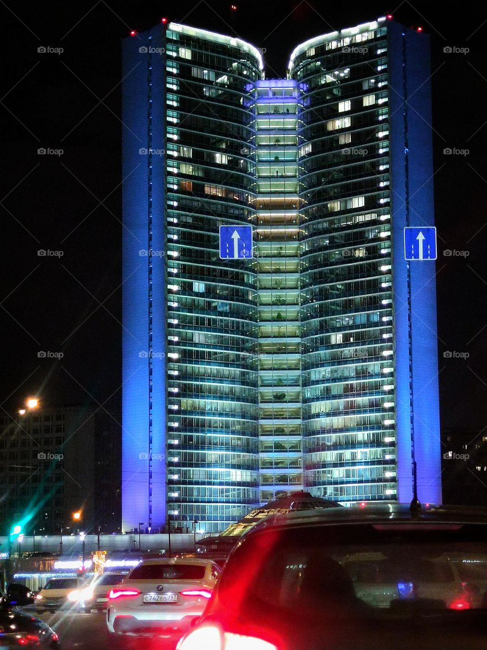 Moscow at night.  View from the road.  House in the form of a book.  The building of the Council for Mutual Economic Assistance.