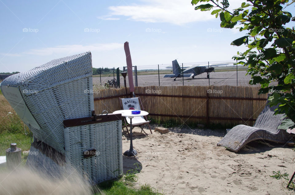 beach chair sand airport by seeker