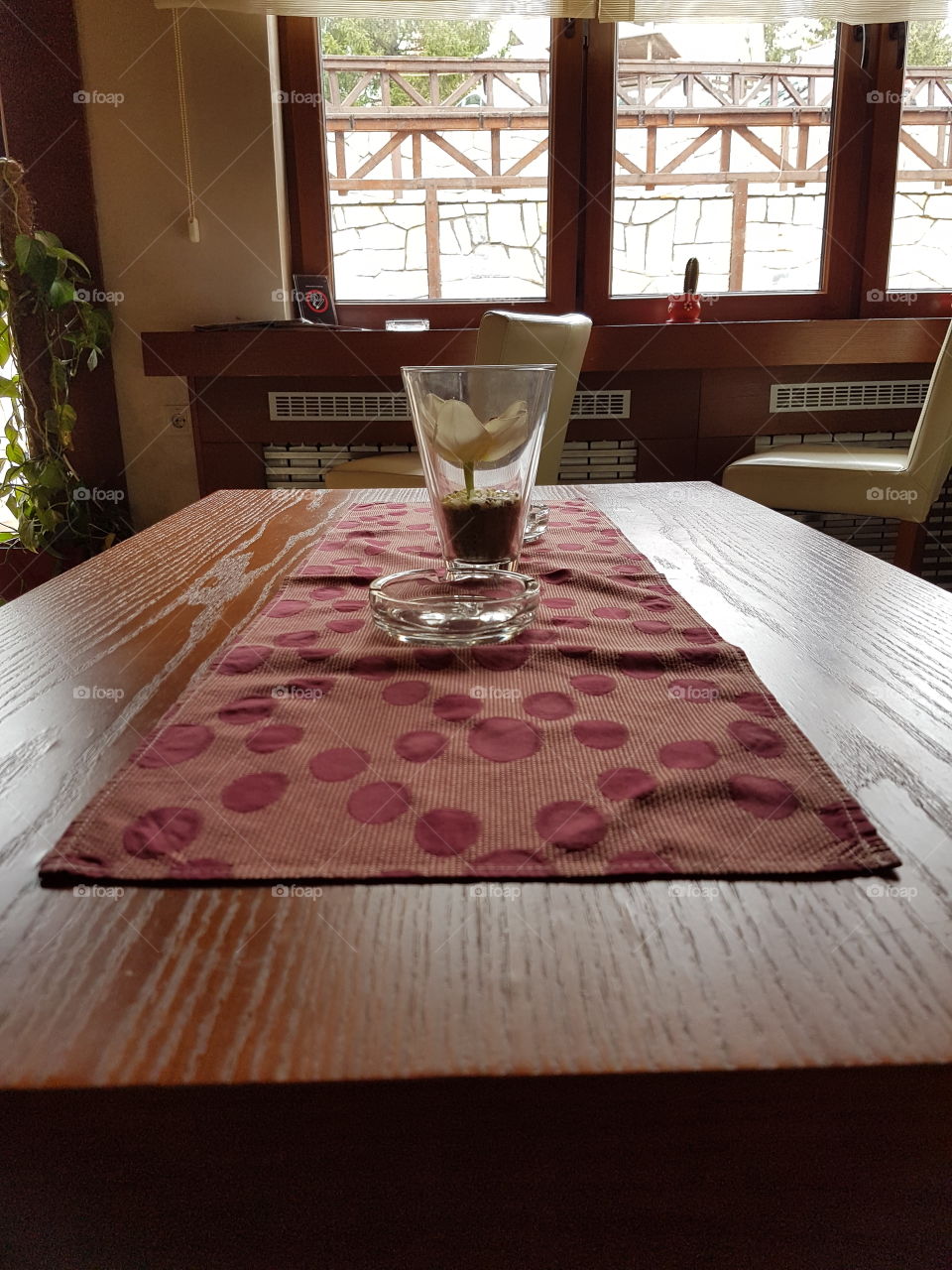 table with ashtray and vase