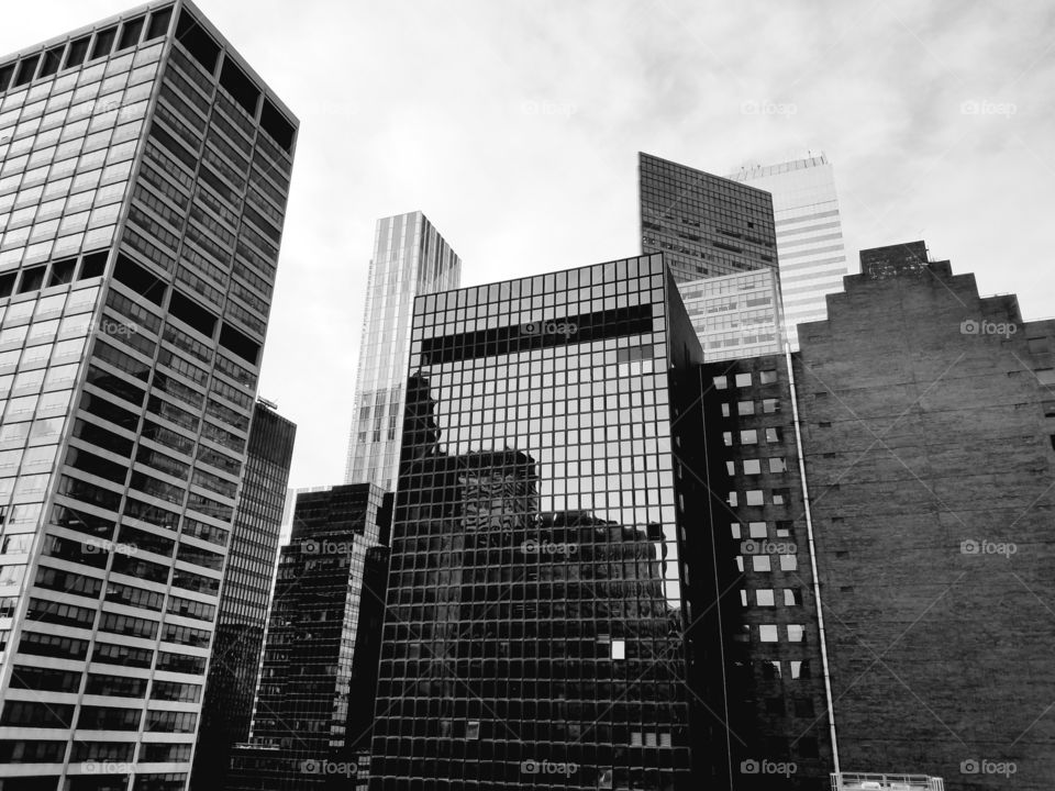 A black and white tribute to most famous cityscape in the world seen from the 30th floor balcony of the Kimberly Hotel.