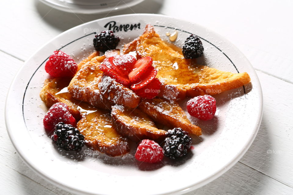 French toast, honey & berries. French toast breakfast plate