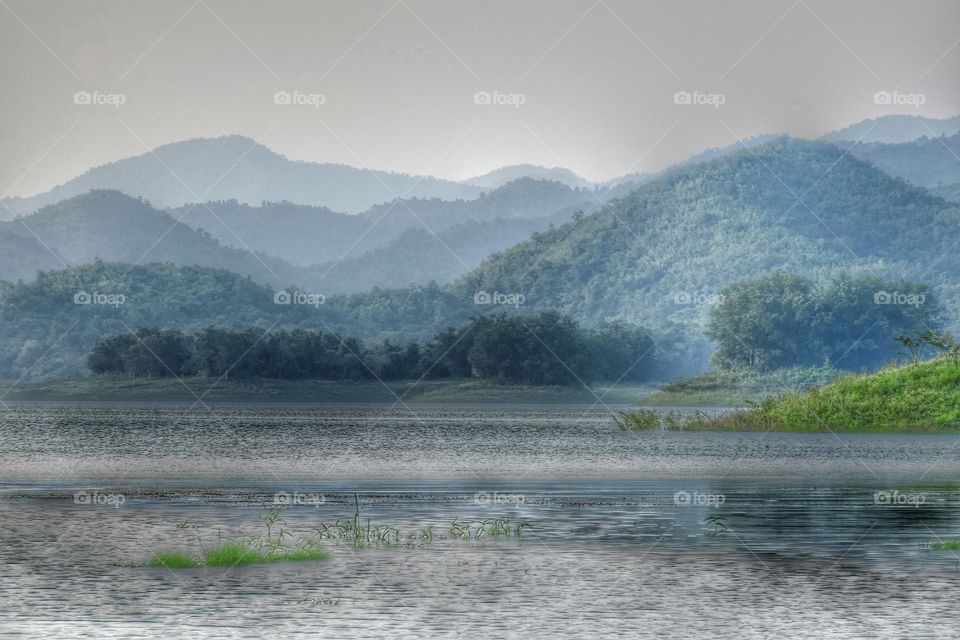 Sunlight image description clouds water light lighting mountain travel