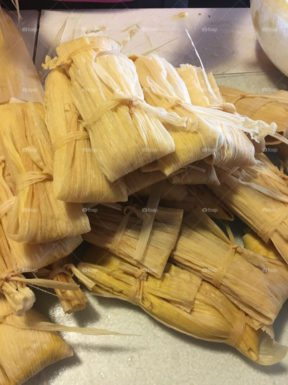 Mexican food wrapped with corn leaf