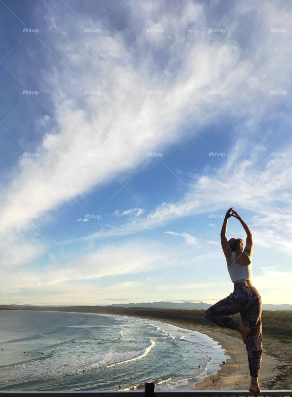 Sunset yoga overlooking a gorgeous Australian beach.