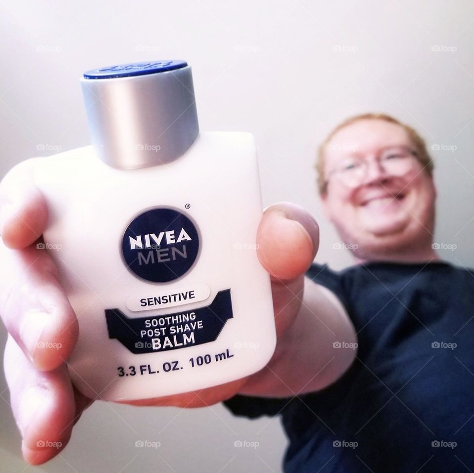 Man holding Nivia for Men & Smiling