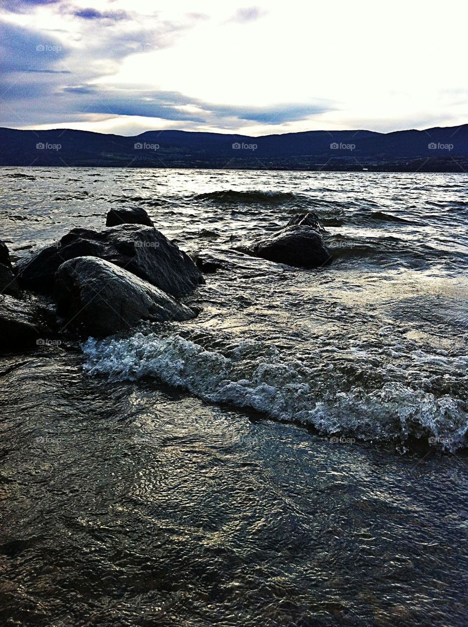 water lake mountains waves by redrock