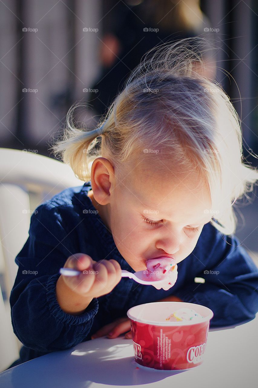 Toddler Eating Ice Cream