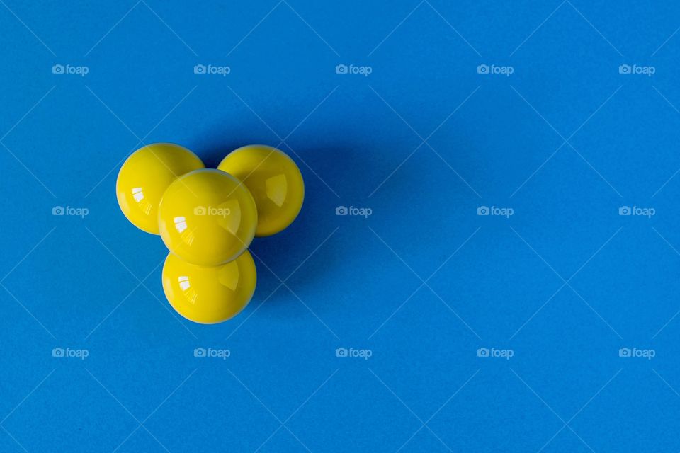 Yellow balls on a blue background