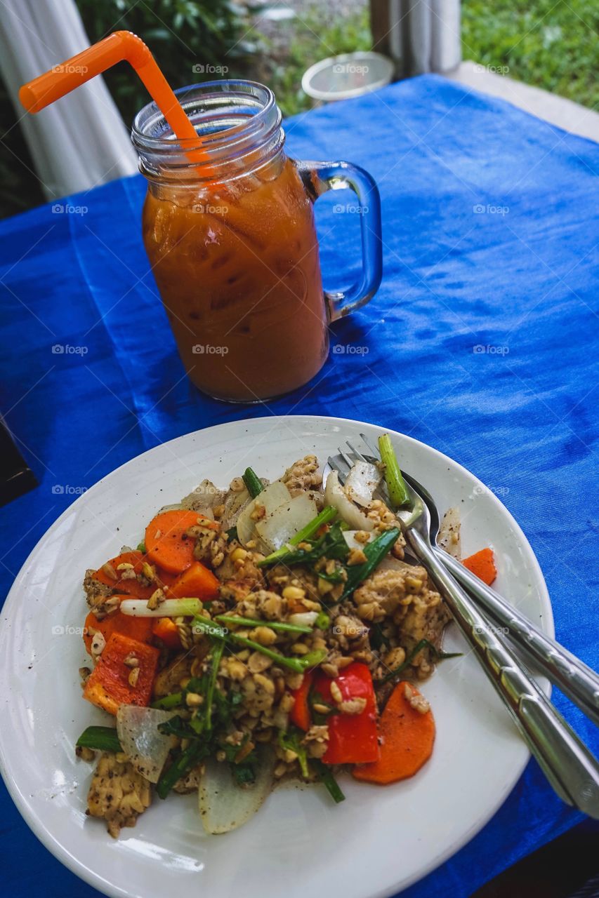 Stir fried tempeh and Thai tea in Chiang Mai, Thailand