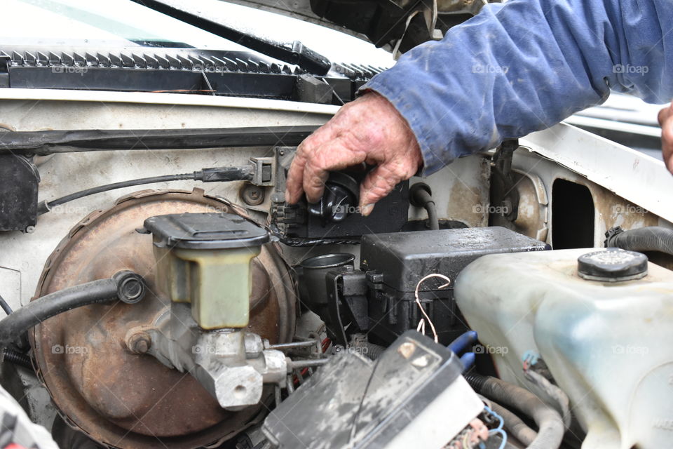mechanic working on a vehicle