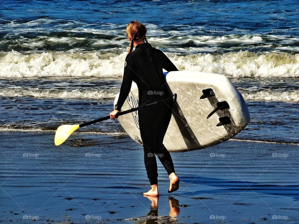 Woman With Paddleboard