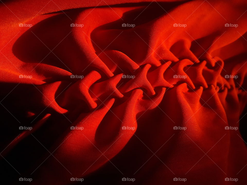 silk non velvetish material hand folded texture