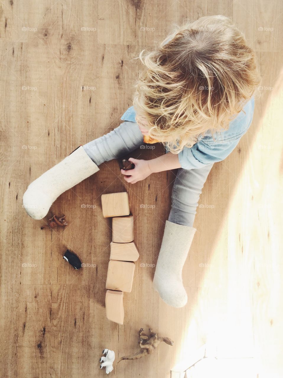 Elevated view of boy playing with toys