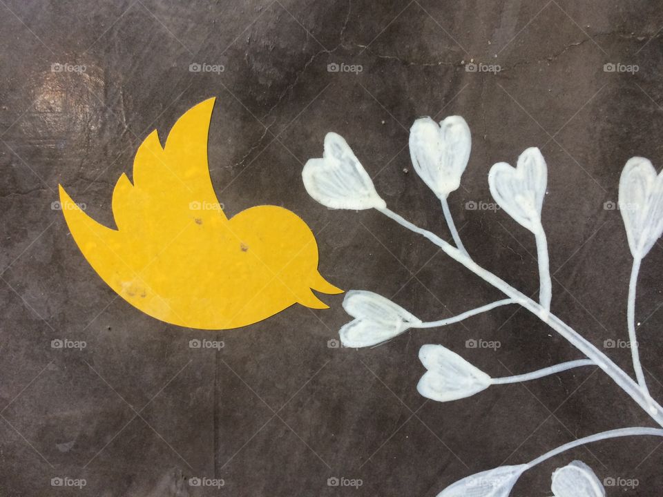 Yellow bird and flower 