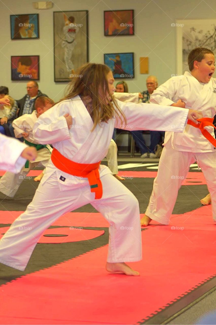 Group of children's practicing karate