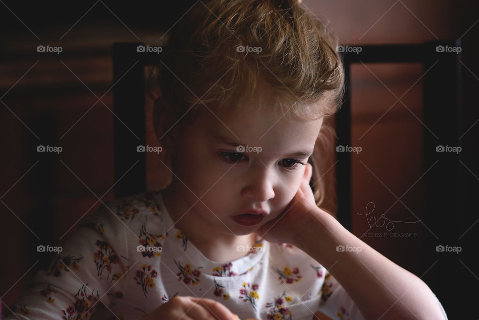 Moody lighting little girl