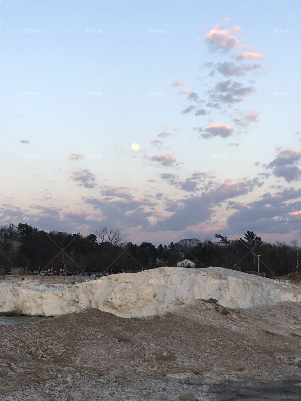 Cloudy sky, purple clouds and the moon