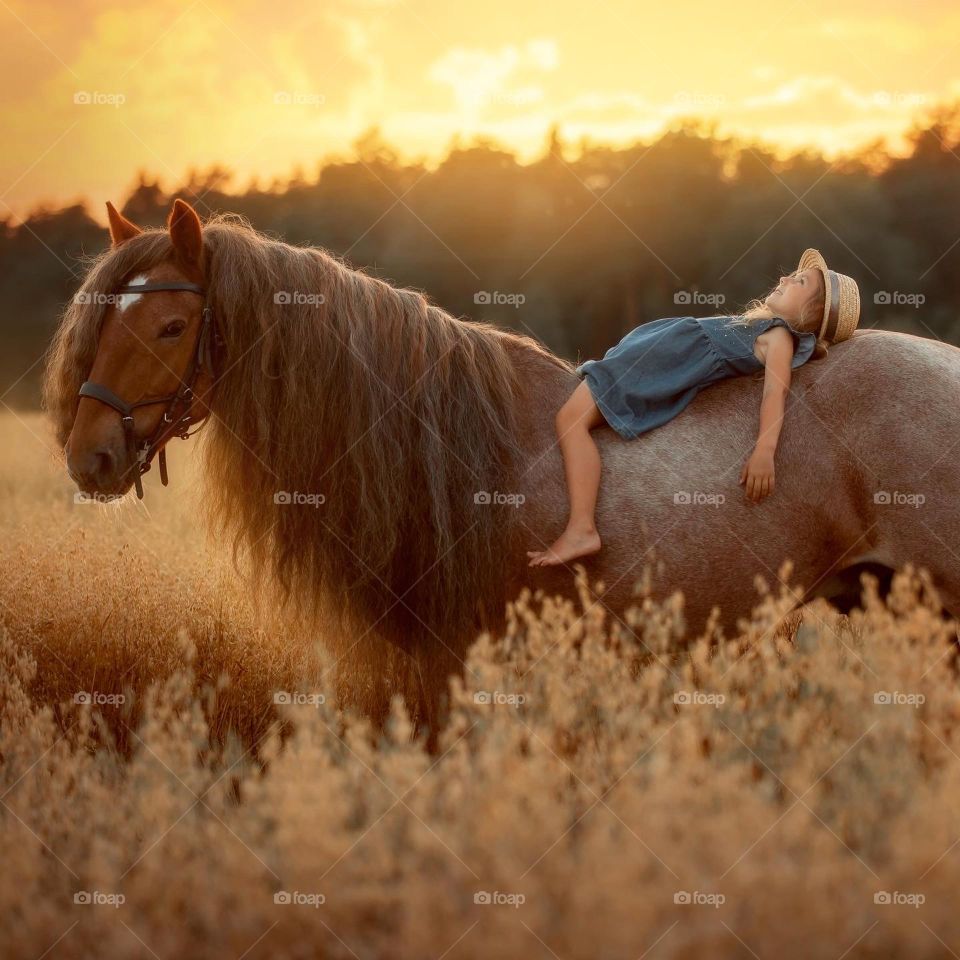 Little girl with horse 