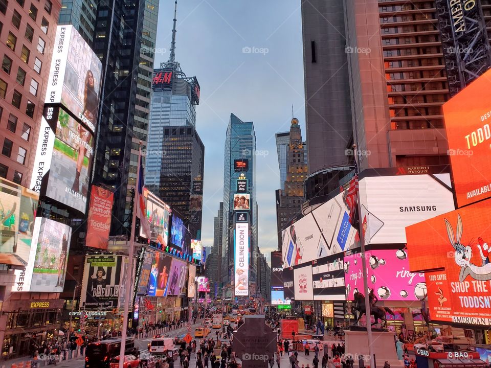 Times Square in New York City pulses with lights, sounds and activity