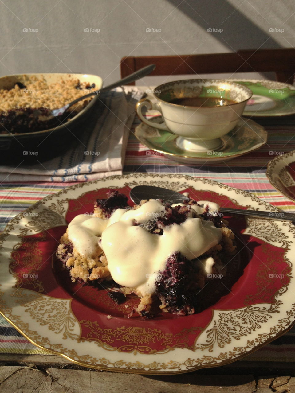 Homemade blueberry pie and coffee.