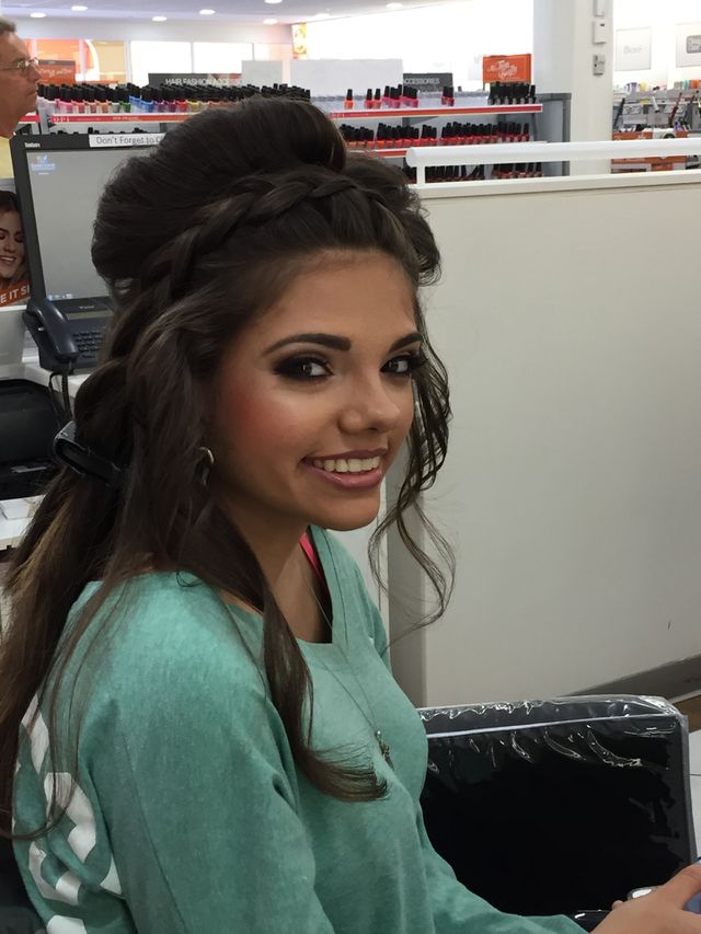 Young woman with stylish hairstyle