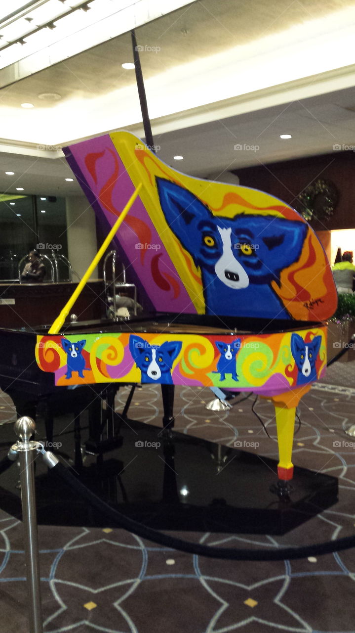 The Rodrigue "Blue Dog" Steinway Piano is a focal piece of the Sheraton Downtown New Orleans. It sits in the lobby between the bar and check in areas.