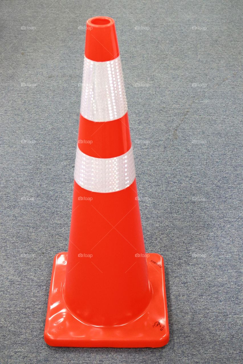 Orange traffic cone with white scotlight