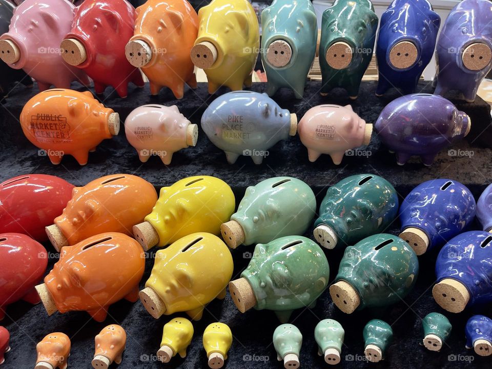 Many pig money box’s in pride colors 