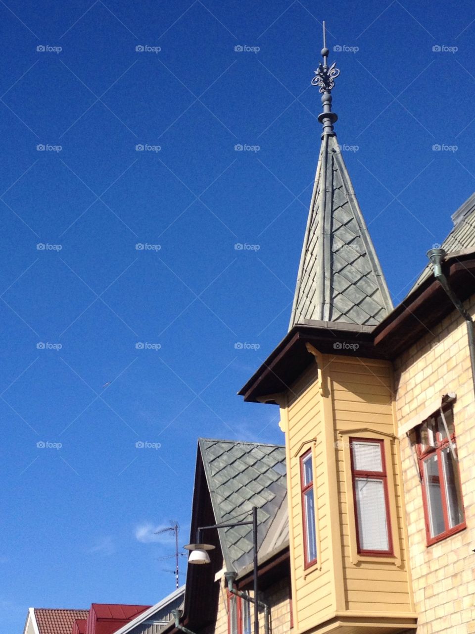 Old wooden house and blue sky