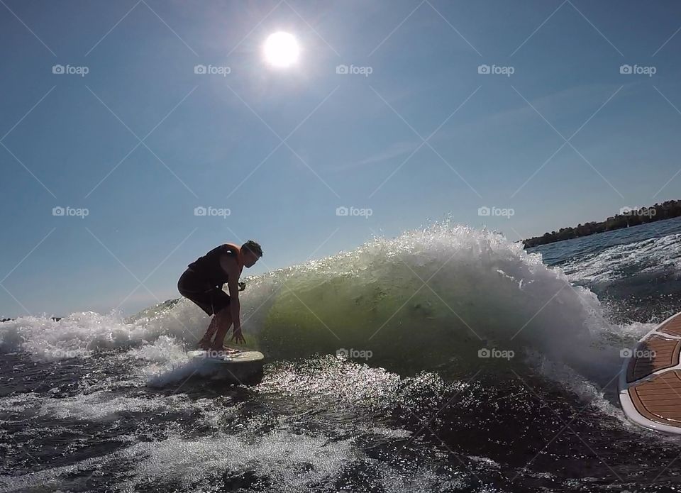 Wakesurf wave with surfer