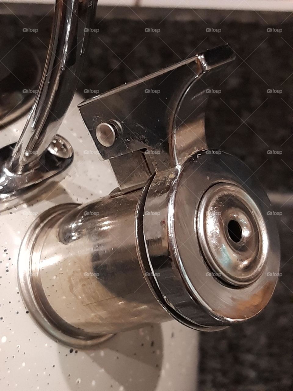 Circular metalic spout of whisteling kettle