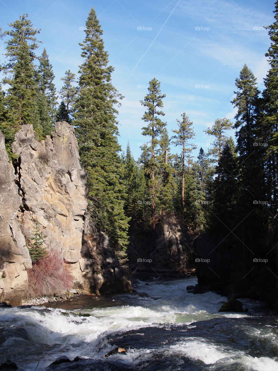 Deschutes River whitewater rushes to Benham Falls in sunny Central Oregon. 