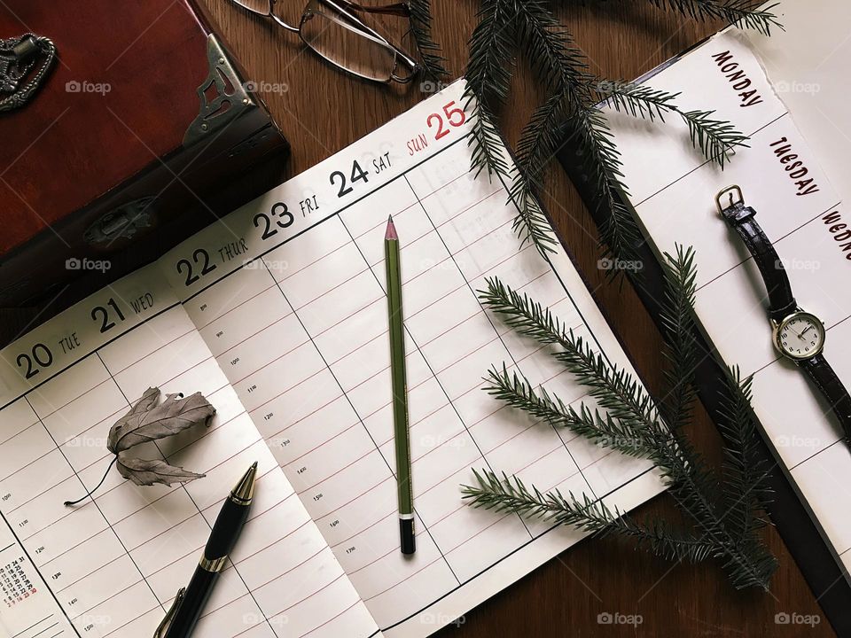 Desktop with calendar and office supplies 